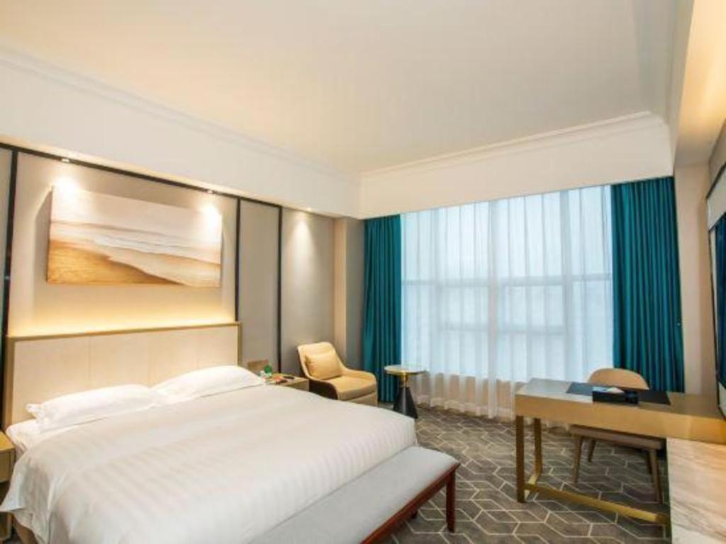 Fenggang Gladden Hotel Tiantangwei Luaran gambar