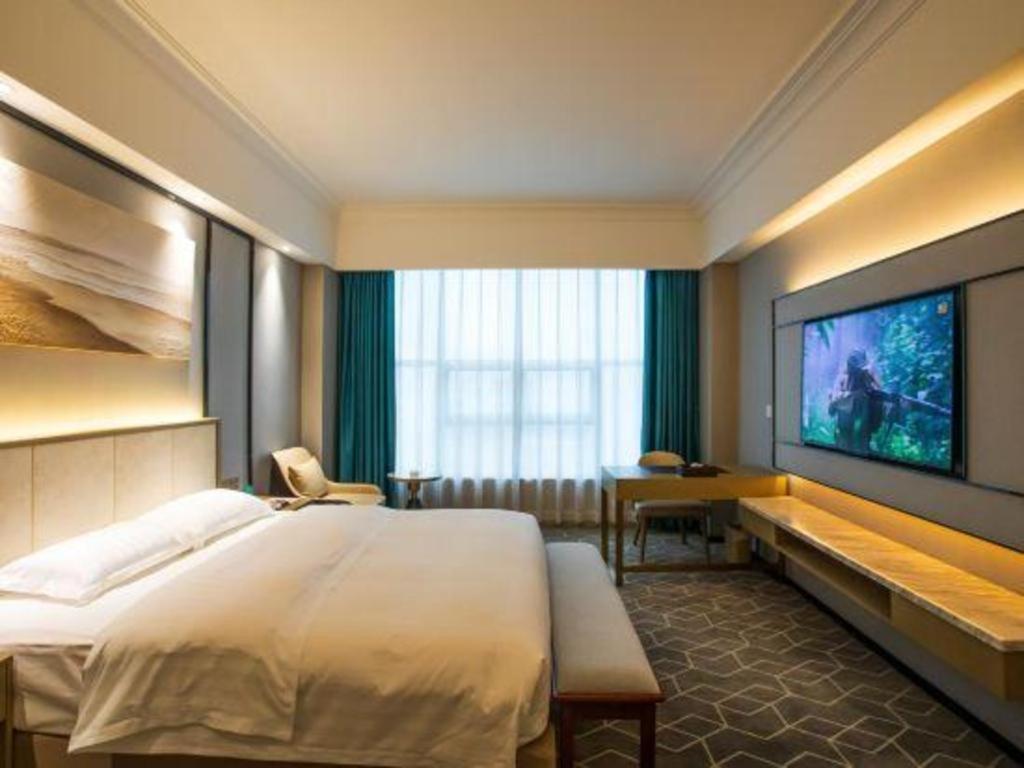 Fenggang Gladden Hotel Tiantangwei Luaran gambar