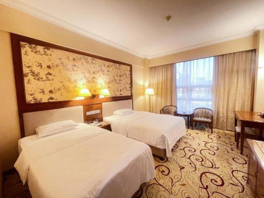 Fenggang Gladden Hotel Tiantangwei Luaran gambar