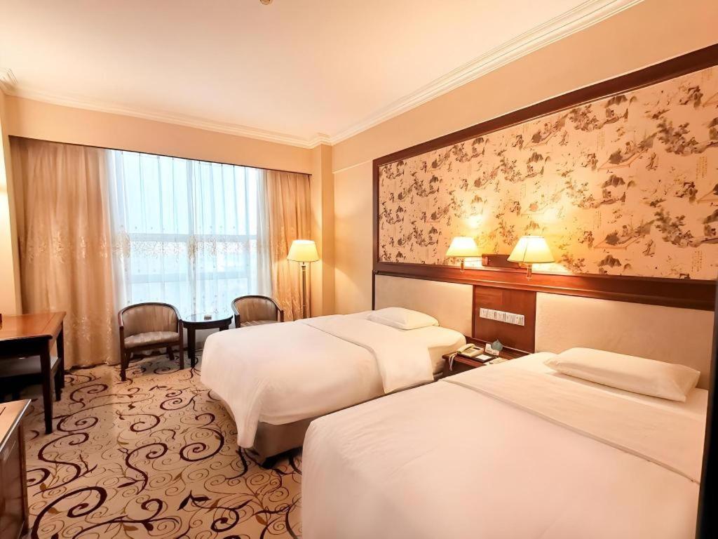 Fenggang Gladden Hotel Tiantangwei Luaran gambar